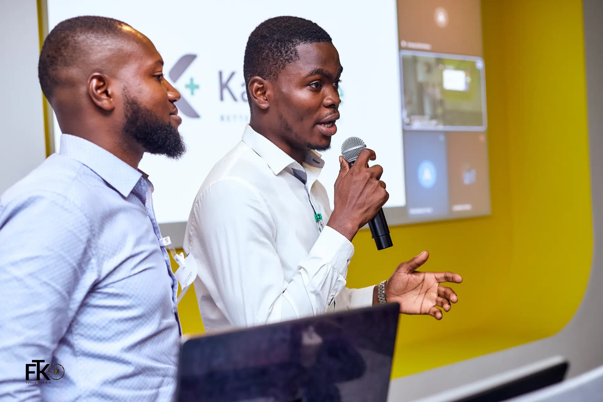 An Ikieguy engineer presenting a platform to a room in Accra